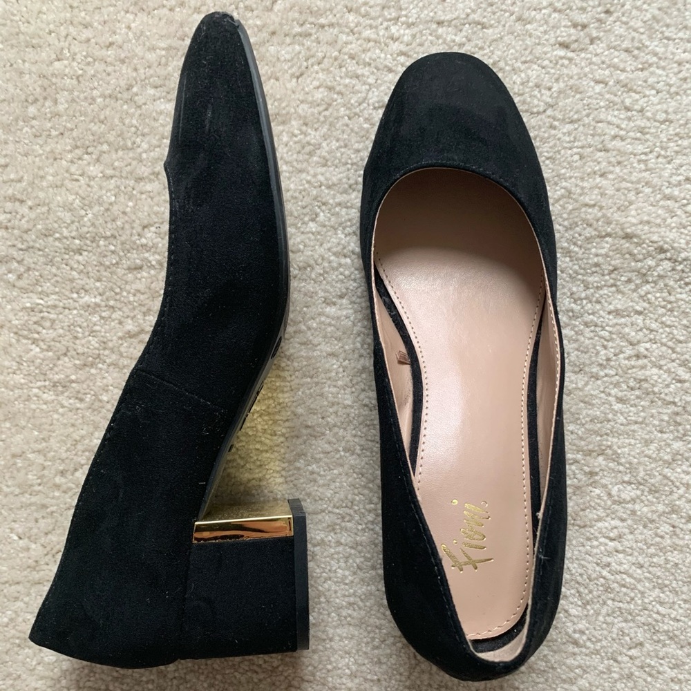 Black block heels with gold accents